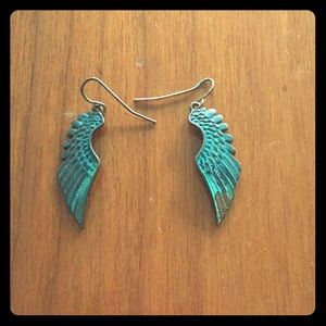 Tough wing dangly earrings